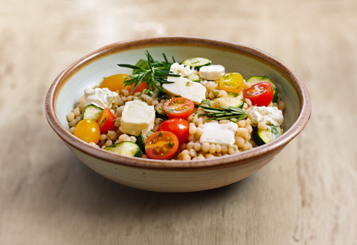 Fregula con zucchine, rosmarino, pomodorini e Stracchino Nonno Nanni