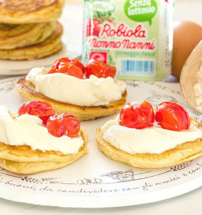 Blinis con Nonno Nanni Robiola and Preserved Tomatoes